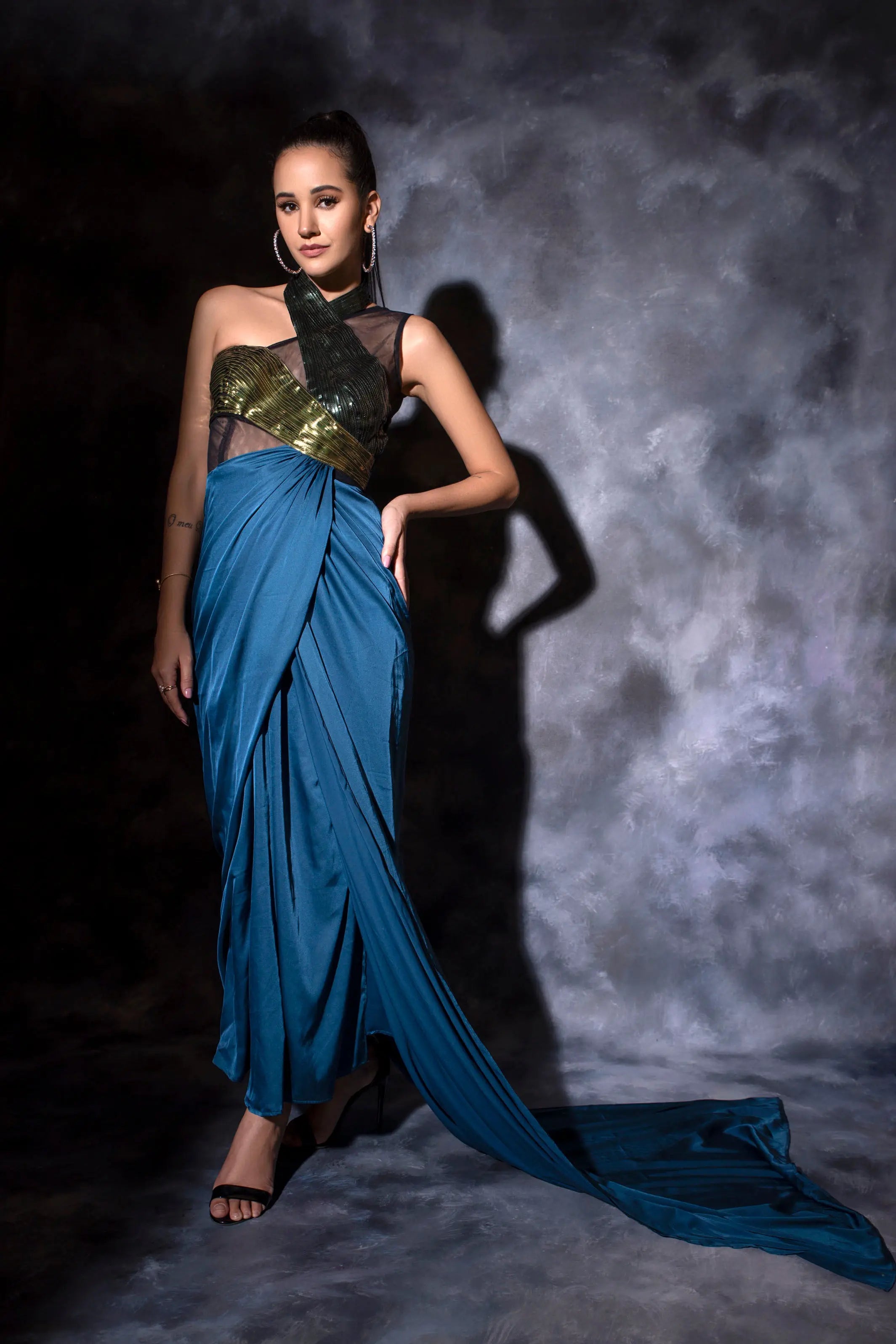 One shoulder drape in teal blue with a metallic molded drape dress Glamfe